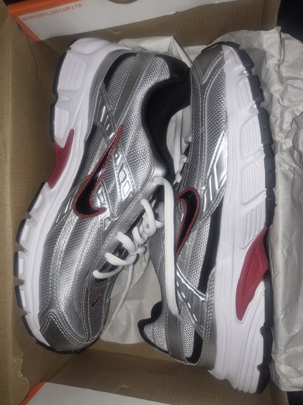 Nike Men's Silver Running Shoes with Red Accents